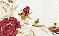 Coussin au point de croix Roselline